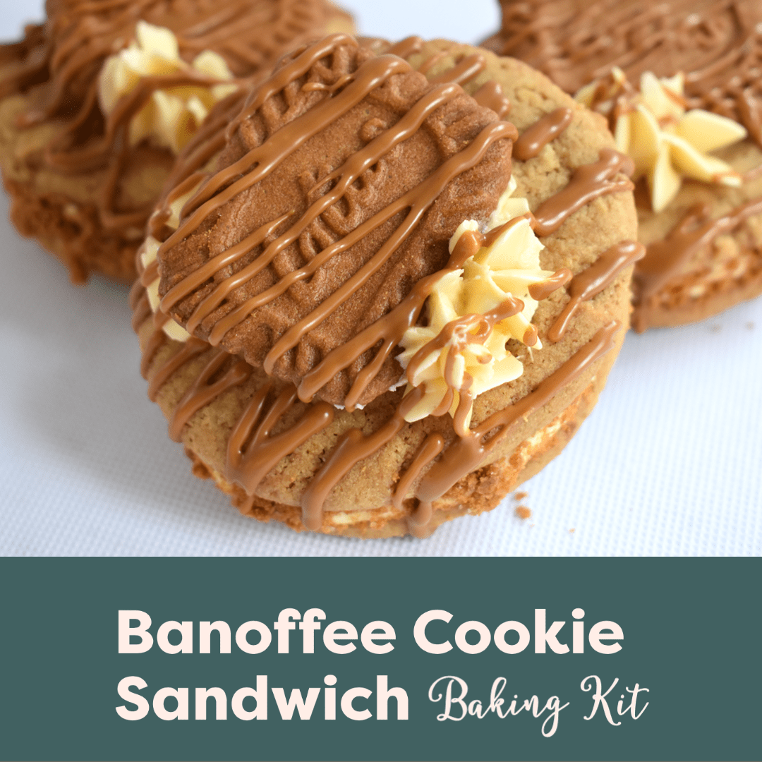 Banoffee Cookie Sandwich Baking Kit link, a banana cookie, sandwiched with Lotus Biscoff buttercream and decorated with buttercream stars, a whole Lotus Biscoff biscuit and biscoff spread drizzle. 